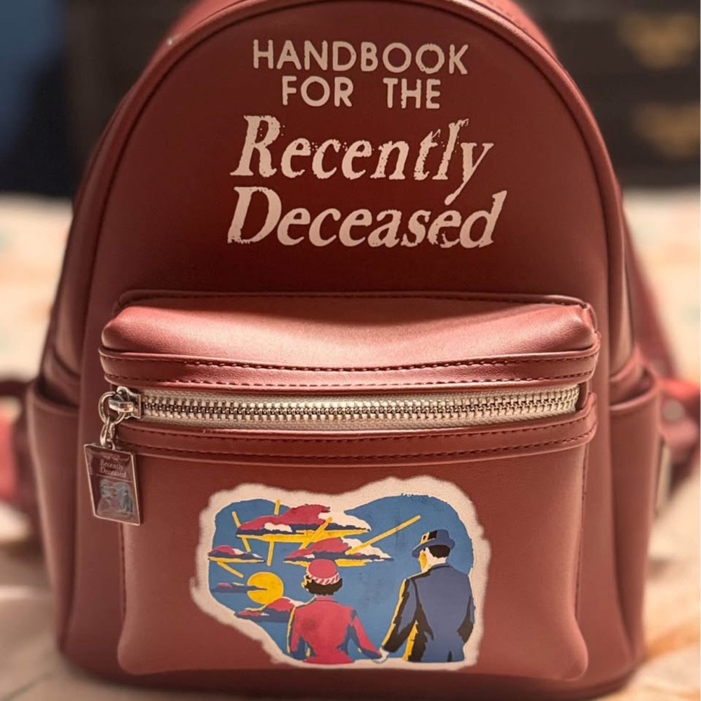 Loungefly Handbook for the Recently Deceased Backpack